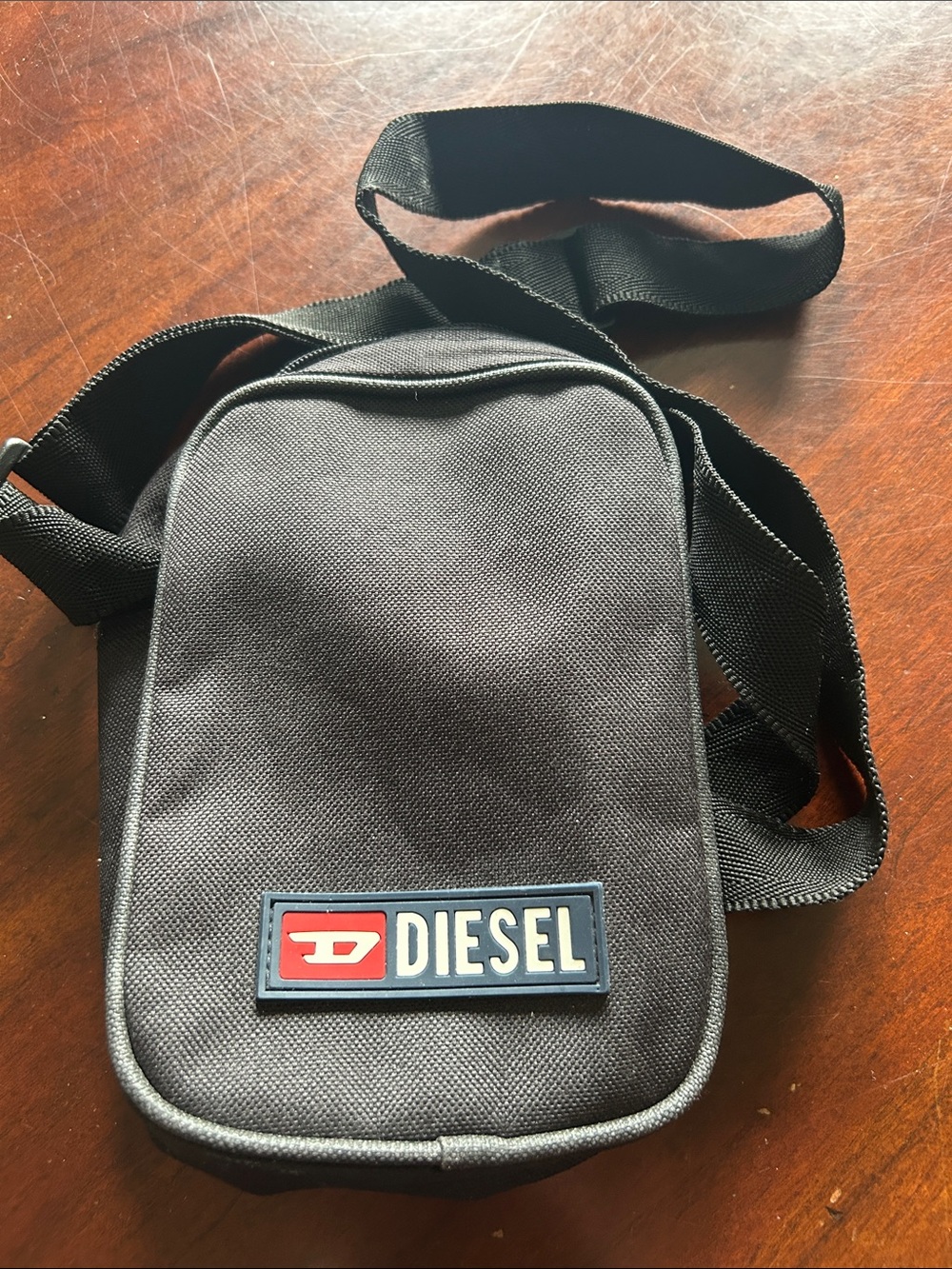 Diesel Black Crossbody Pouch with Red Logo Accent